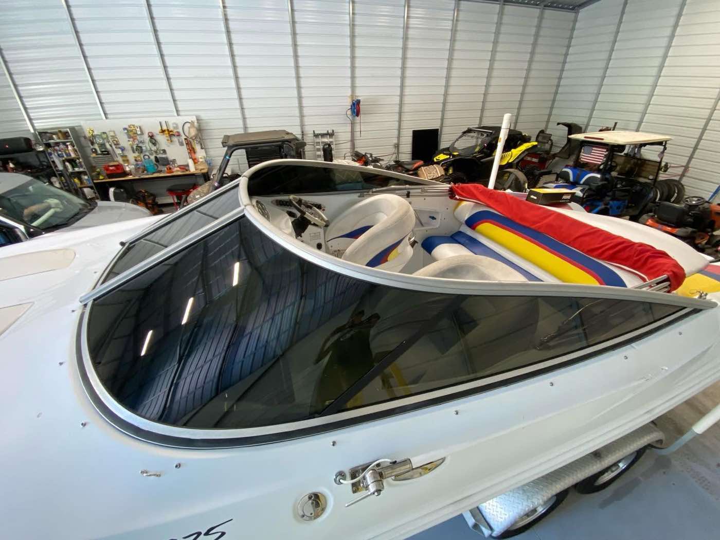 Boat interior showing tinted windshield glass, Mitchell's Tinting