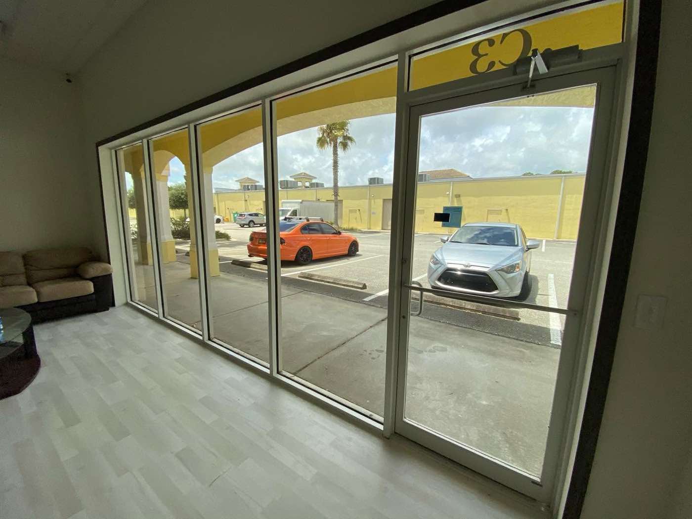 Retail storefront exterior with tinted glass, Mitchell's Tinting