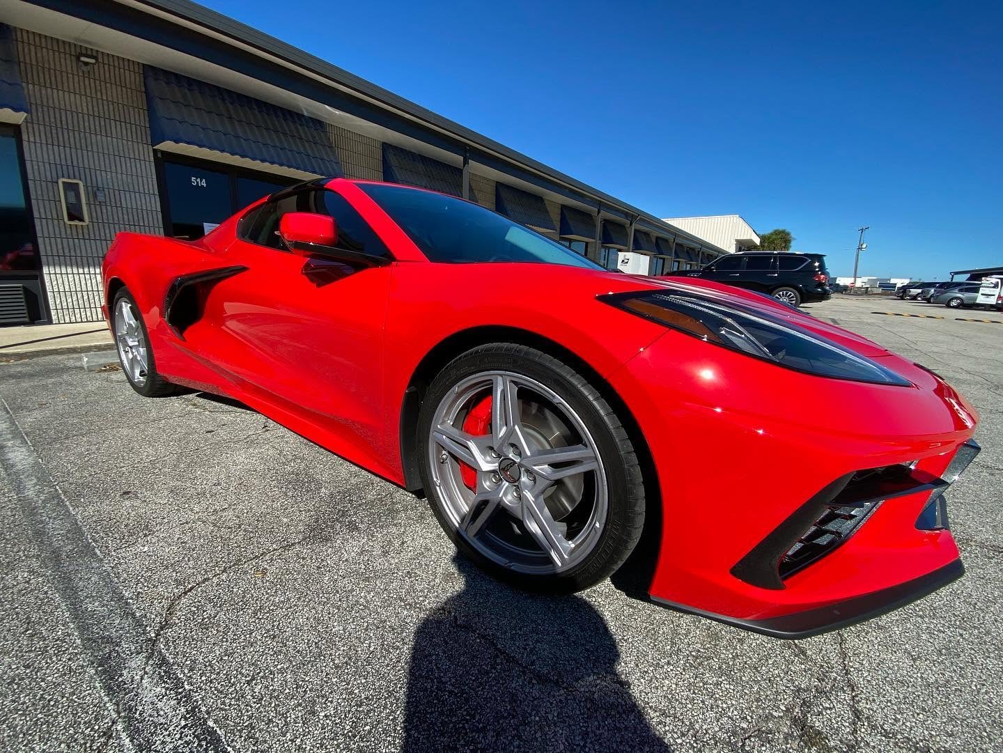 Red Chevrolet Corvette with fresh ceramic window tint, Mitchell's Tinting Port Orange