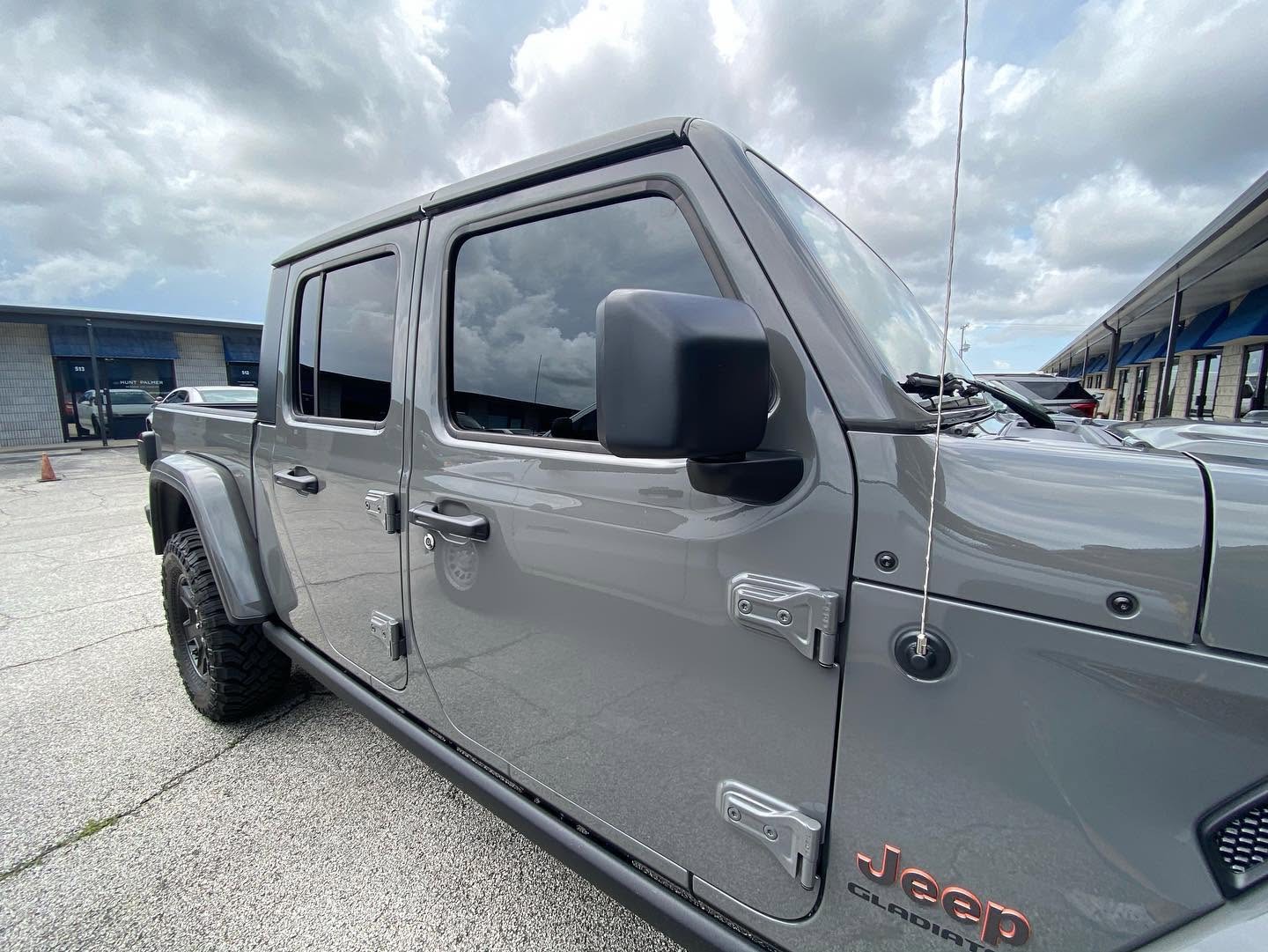 Gray Jeep Gladiator truck with ceramic window tint, Mitchell's Tinting Port Orange